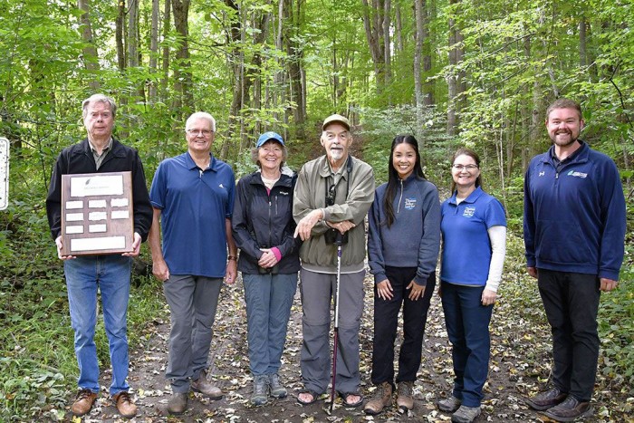 At site of Joany's Woods, land trusts receive award.