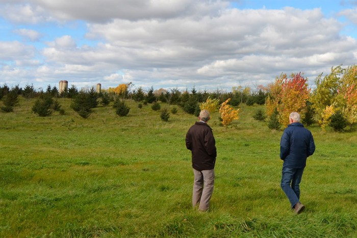 Forestry specialist Ian Jean with agricultural producer and steward David Ball.