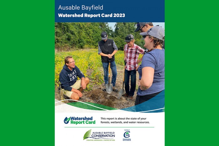 Cover of 2023-2028 Watershed Report Card showing agricultural producer and students at field.