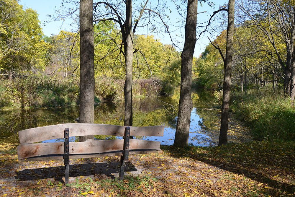 A file photo of bench on South Huron Trail.