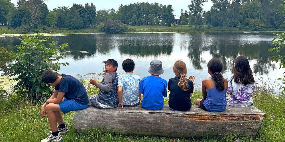 A file photo of campers enjoying nature day camp.