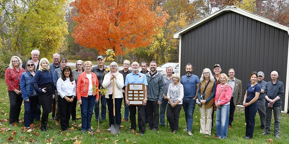 A tree planting and ceremony recognized local landowner stewardship champions and funding partners.